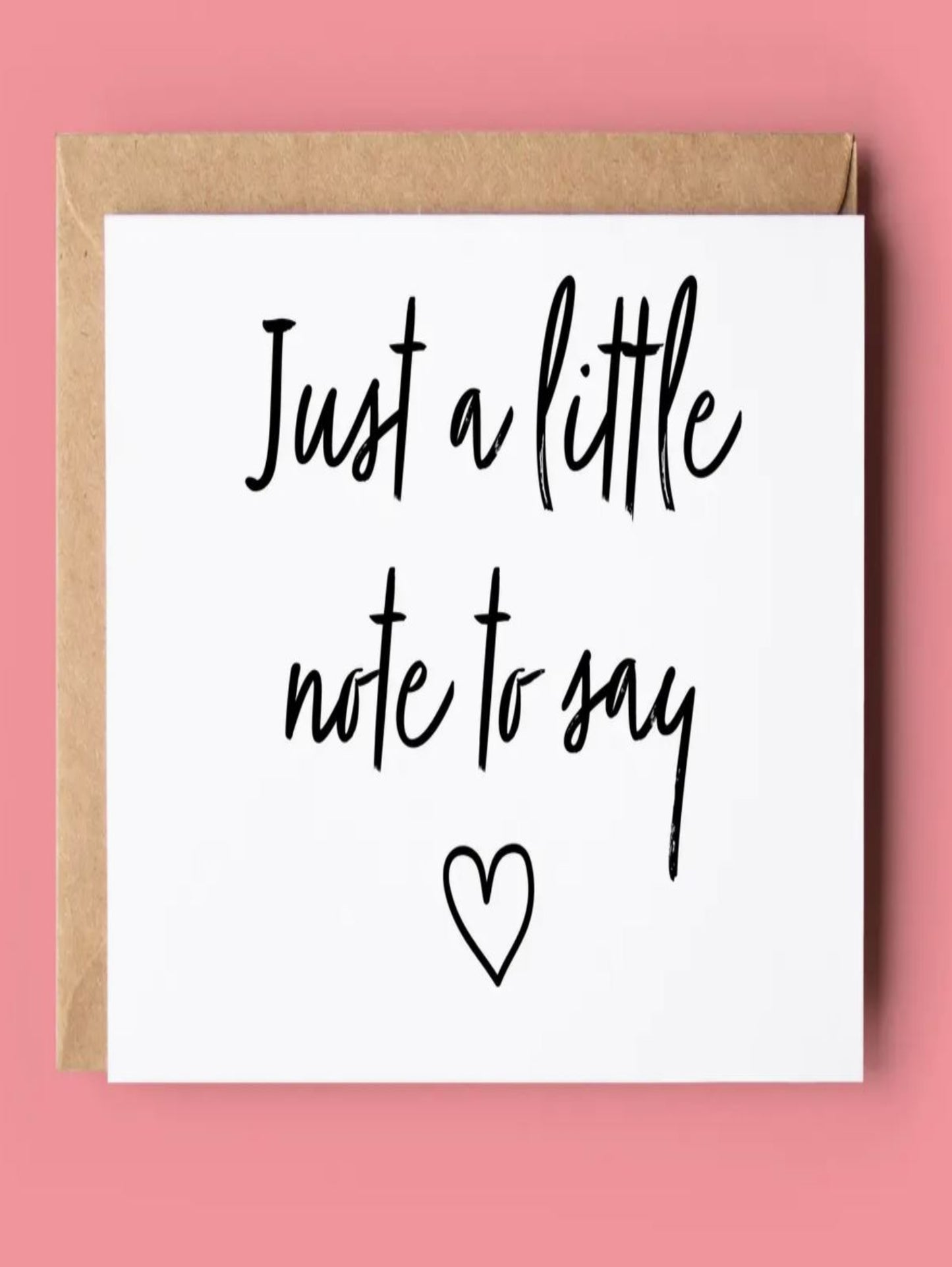 This is a white card with letters in black that read 'just a little note to say'