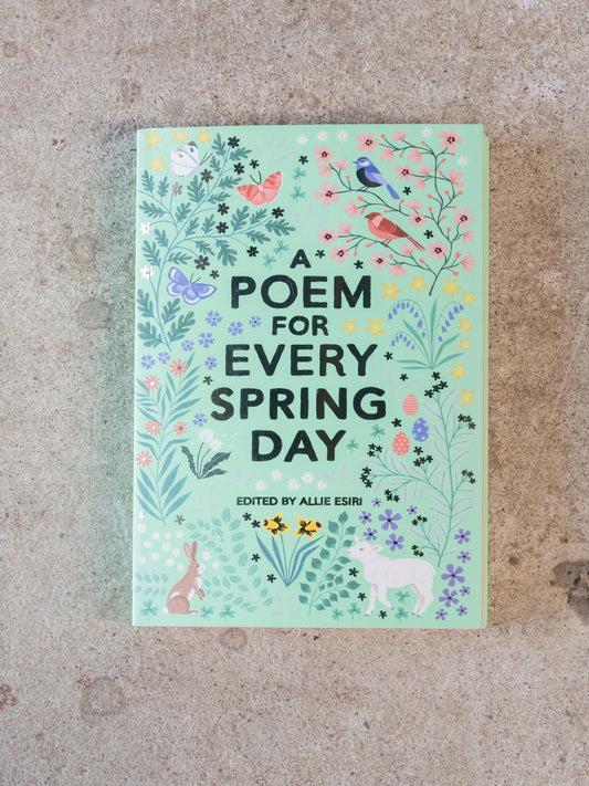 Book cover of 'A Poem for Every Spring Day' with floral and nature-themed design on a textured surface.