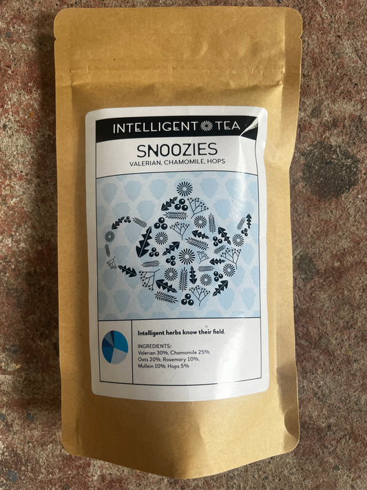Intelligent Tea Snoozies package on a textured surface