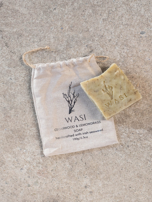 Bar of soap with 'WASI' branding on a textured surface. 180g.