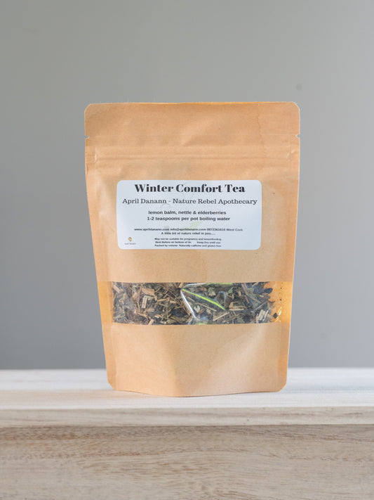 a picture of a brown bag of tea with winter comfort tea label.