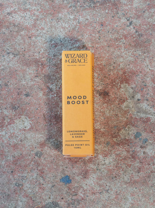 Yellow box labeled 'Wizard & Grace Mood Boost' on a textured surface